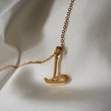 Arabic initial necklace